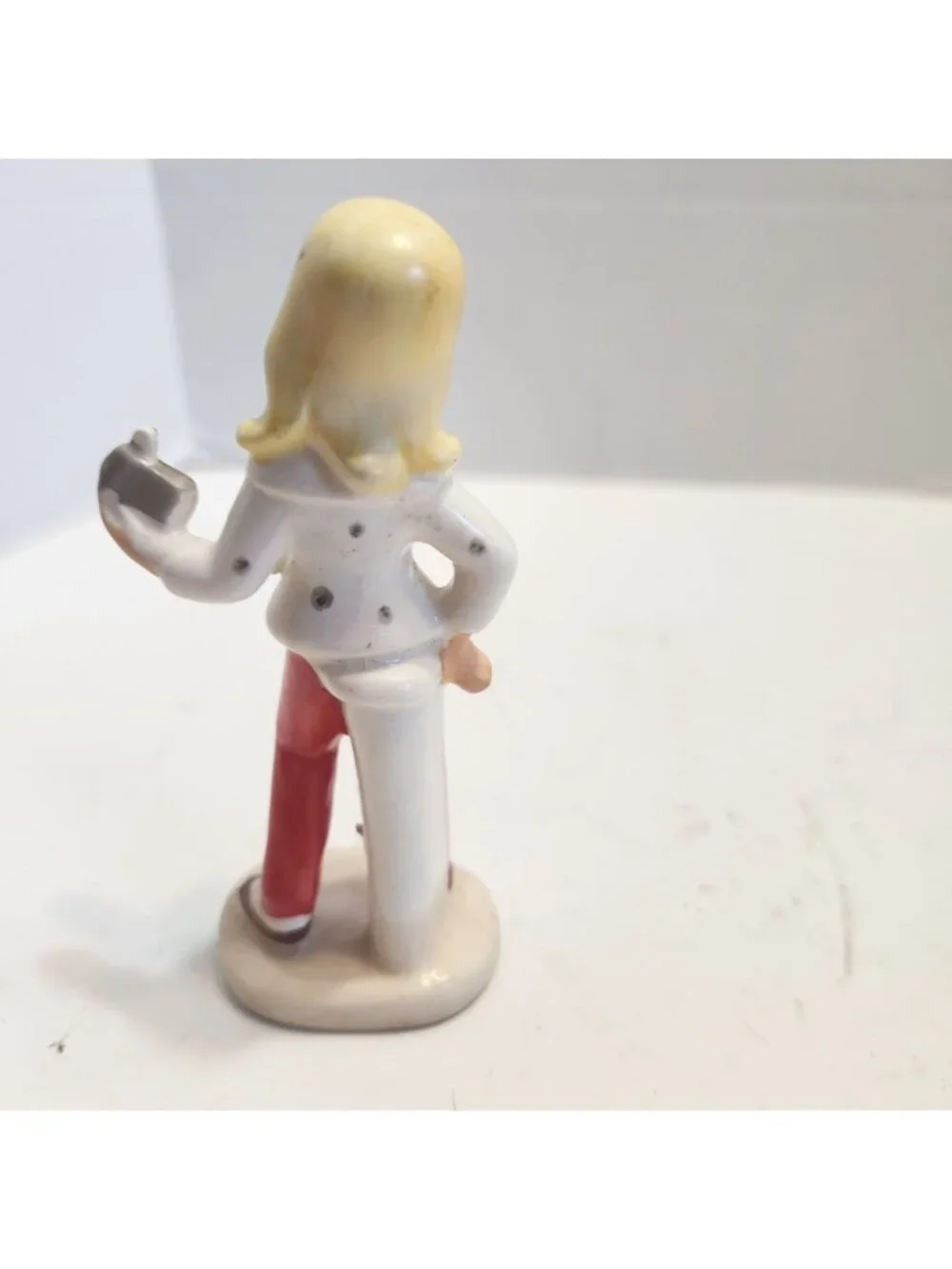 Vintage Small Ceramic Figurine Of Woman Red Pants & White Blouse with Radio READ